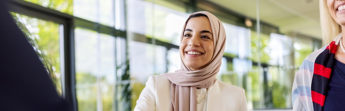 A young professional woman wearing hijab